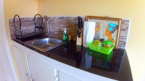 Caribbean Dream Vacation Property CD3 tesisinde mutfak veya mini mutfak