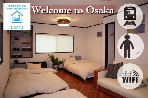 a bedroom with two beds and a sign that reads welcome to oasis at NexStay HOUSE Osaka West in Osaka