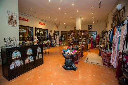 a store with a bunch of merchandise in a room at Zalagh Kasbah Hotel & Spa in Marrakech
