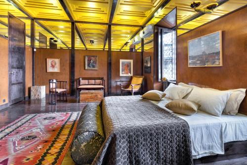 a bedroom with a large bed in a room at Castle in Old Town in Tbilisi City