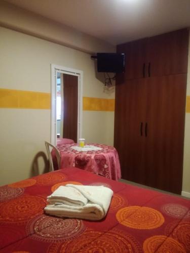 Ένα ή περισσότερα κρεβάτια σε δωμάτιο στο Hotel "VIRGEN DEL SOCAVON"