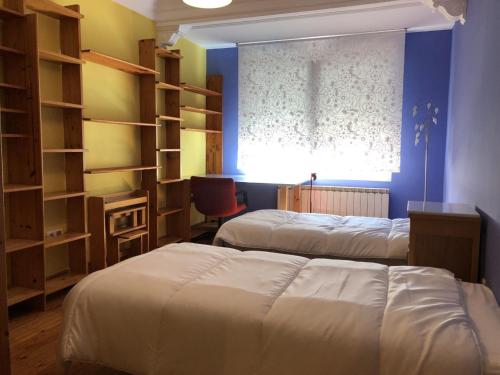 Ένα ή περισσότερα κρεβάτια σε δωμάτιο στο Puerta Del Carmen