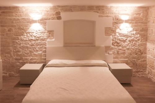 Ένα ή περισσότερα κρεβάτια σε δωμάτιο στο B&b il castello
