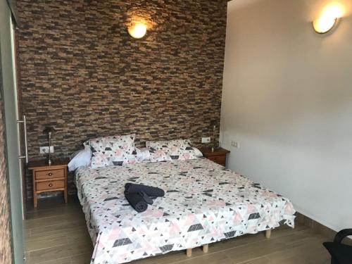 Katil atau katil-katil dalam bilik di Apartamentos Algodonales