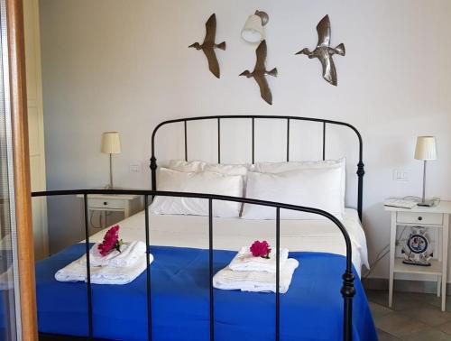 Кровать или кровати в номере Villa Eos