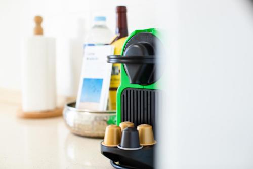 a hairbrush sitting on top of a counter with bottles at Lima waikiki beach in Corralejo