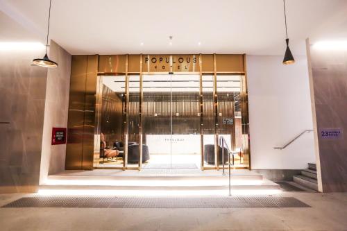 a lobby with a door to a store at L Hotel at Bugis Ville in Singapore