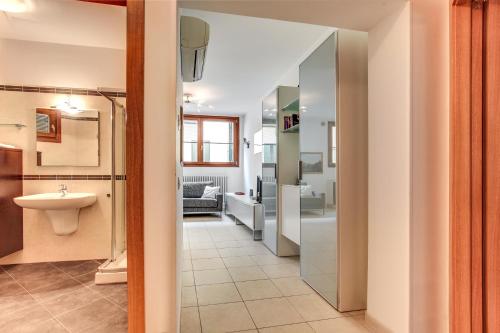 a bathroom with a toilet and a sink in a room at Priuli Canal View in Venice