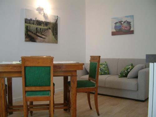 Khu vực ghế ngồi tại Casa vacanza Piazza Marconi