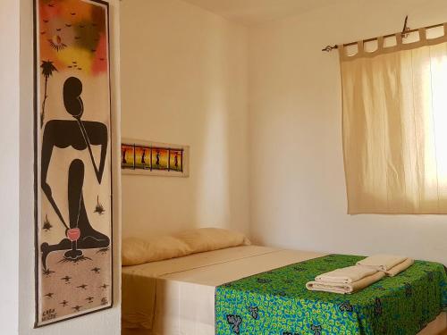 Ένα ή περισσότερα κρεβάτια σε δωμάτιο στο Villa Maris Ecolodge