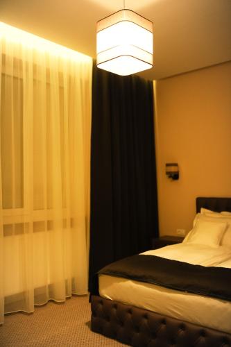 Ένα ή περισσότερα κρεβάτια σε δωμάτιο στο Vine Rooms