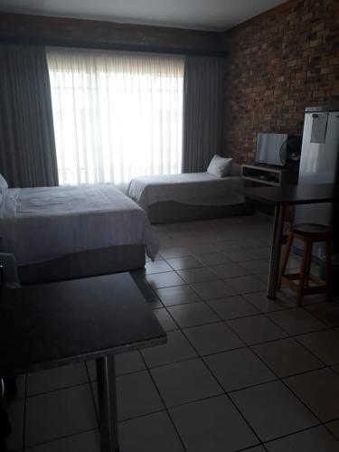 Ένα ή περισσότερα κρεβάτια σε δωμάτιο στο Dream lodging apartment