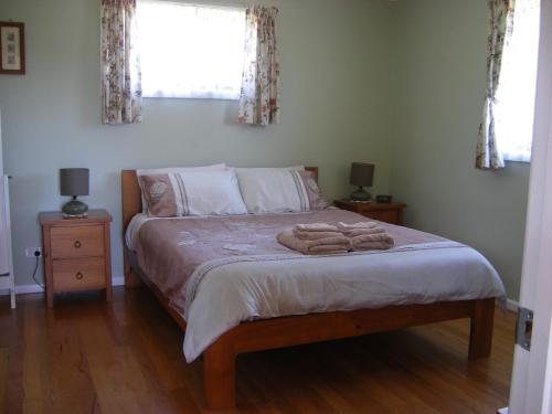 Posteľ alebo postele v izbe v ubytovaní Yasuragi Cabins