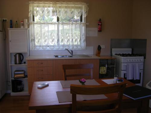 Köök või kööginurk majutusasutuses Yasuragi Cabins
