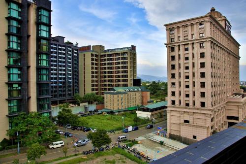 an aerial view of a city with tall buildings at Yixiang Spring Travel in Jiaoxi