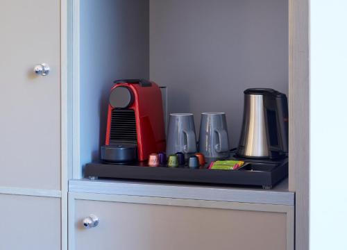 54 Queen's Gate Hotelにあるコーヒーまたはお茶