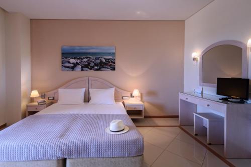 Hotel Poseidonにあるベッド