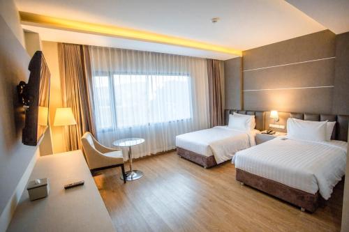 Katil atau katil-katil dalam bilik di The Cheewin Hotel And Convention