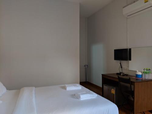 Postel nebo postele na pokoji v ubytování Maruay