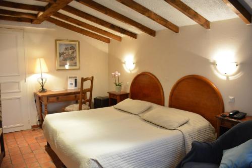 Katil atau katil-katil dalam bilik di Logis Le Clos Deauville Saint Gatien