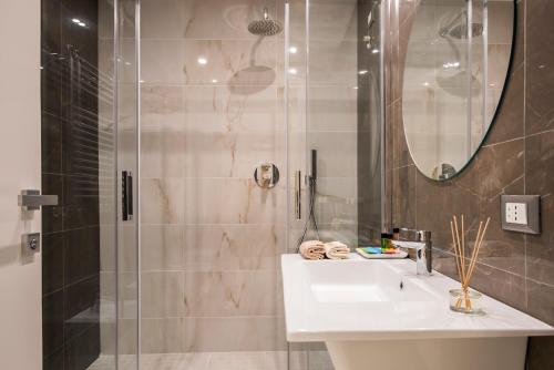 a bathroom with a sink and a shower at Residenza Venti Settembre in Rome