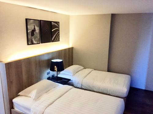 The 28th Hotelにあるベッド