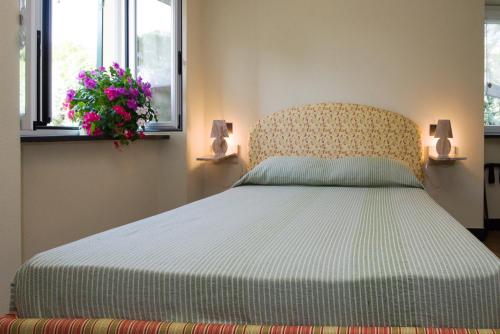 Olivenere agriturismoにあるベッド