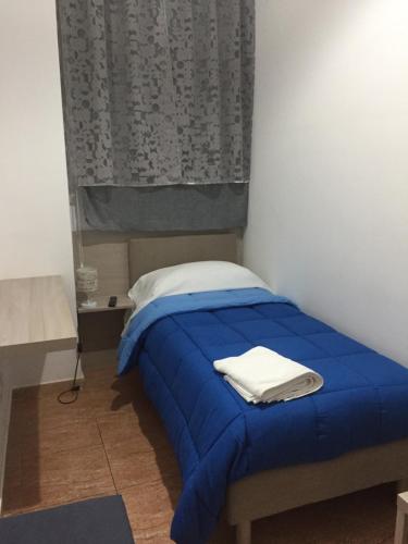 Кровать или кровати в номере Beauty House