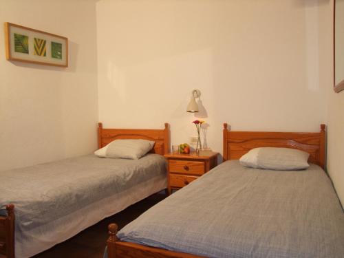 Postel nebo postele na pokoji v ubytování Casitas Vista Valle Alto