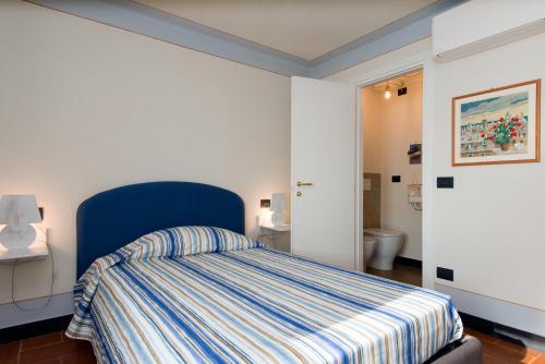 Olivenere agriturismoにあるベッド