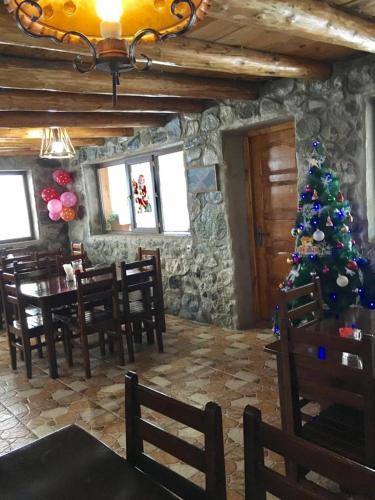 Restaurant ou autre lieu de restauration dans l'établissement Guesthouse of Manoni Ratiani