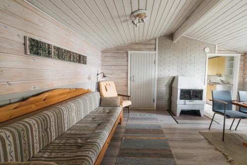Katil atau katil-katil dalam bilik di Jokiniemen Matkailu Cottages