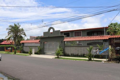 a house on the side of a street at Jaco Sol Quadplex 11A in Jacó