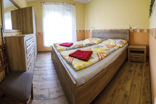 מיטה או מיטות בחדר ב-Villa Gracia Podhájska