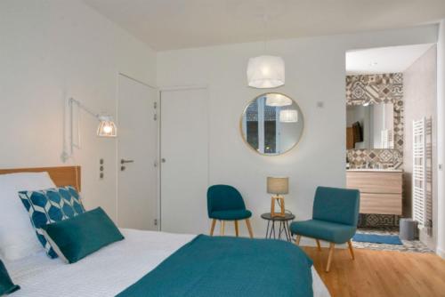 Ένα ή περισσότερα κρεβάτια σε δωμάτιο στο L'Abelli d'Estelle