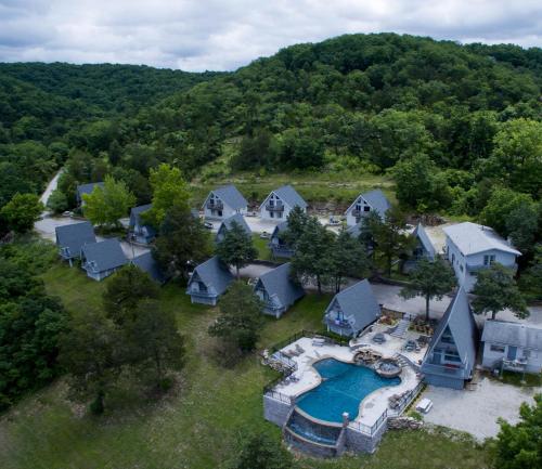 an aerial view of a home with a swimming pool at Alpine Lodge Resort in Branson