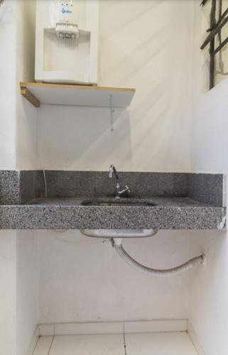 Ένα μπάνιο στο BH EXPO SUITES & KITNETES