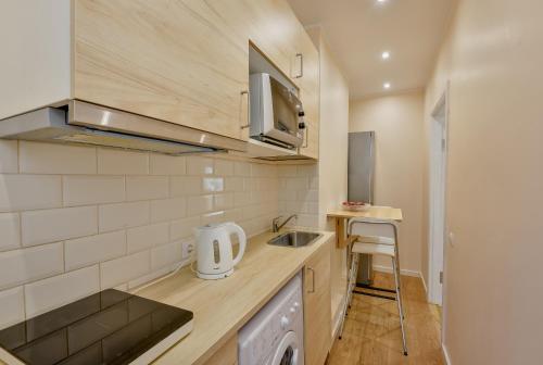 Køkken eller tekøkken på Suites by Riga Old Town