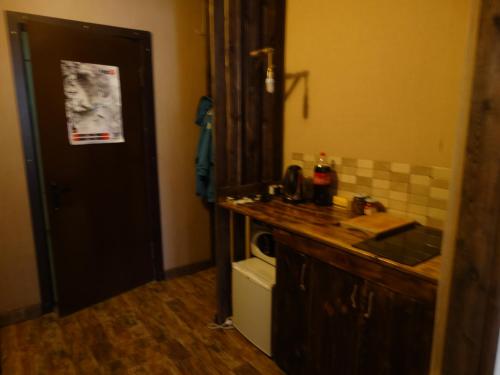 a kitchen with a sink and a counter top at New Gudauri Gudauri Palace in Gudauri