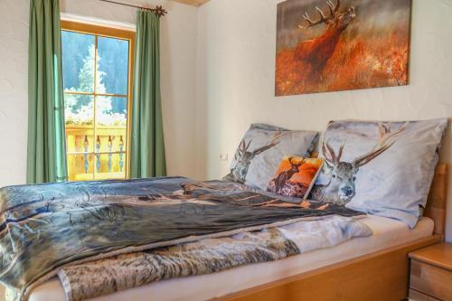 Postel nebo postele na pokoji v ubytování Almchalet Pöllatal