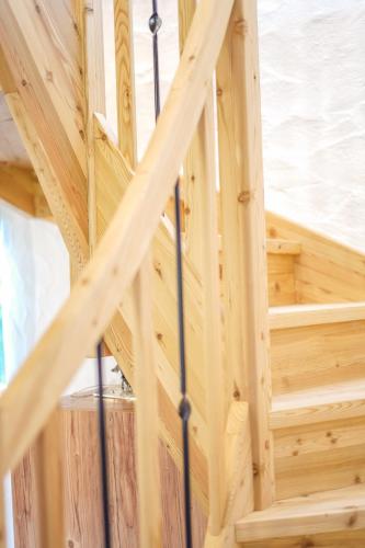 a wooden staircase in a wooden house at Almchalet Pöllatal in Rennweg