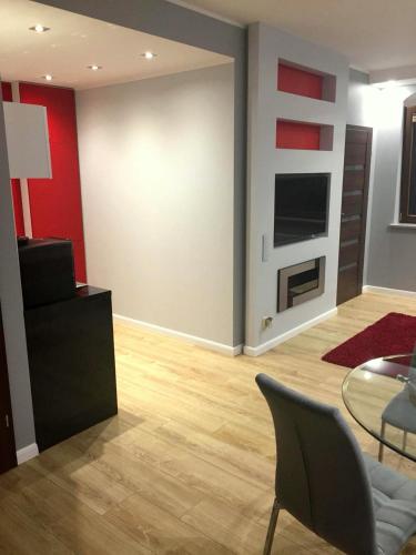 Televisyen dan/atau pusat hiburan di JAB Apartments Panoramika Business & Family