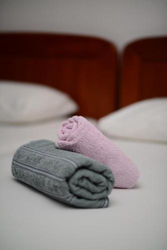 a towel on a white table with a towel at Villa Avelina in Mali Lošinj