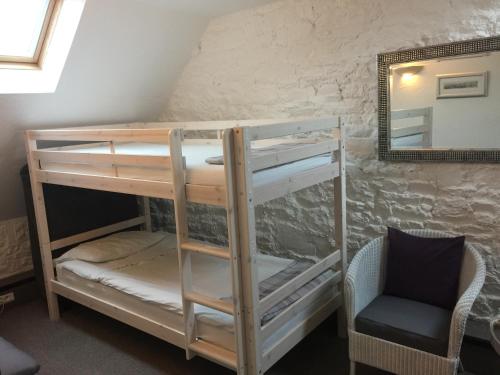 Postel nebo postele na pokoji v ubytování Au Bon Accueil