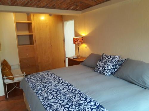Postel nebo postele na pokoji v ubytování Pied à Terre at Casitas Aparicio