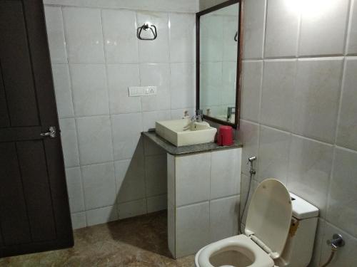 Koupelna v ubytování Kwality Estate