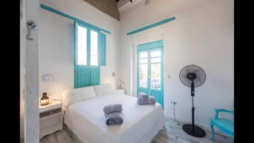 Giường trong phòng chung tại casa a 800 metros de la playa de Las Arenas