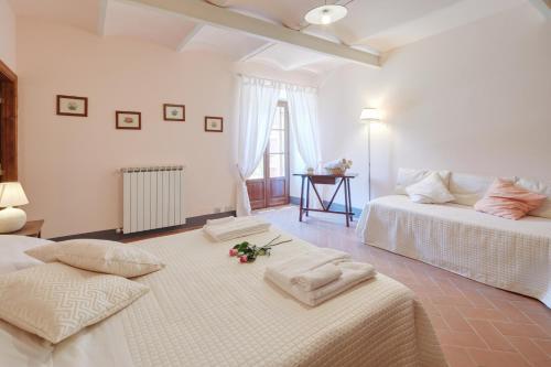 Katil atau katil-katil dalam bilik di Borgo Santa Maria in Valle