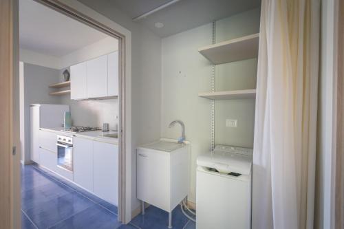 Kuchyň nebo kuchyňský kout v ubytování Residence Delfino, Portorosa