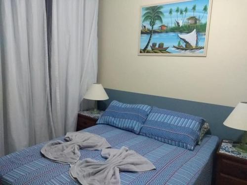 Katil atau katil-katil dalam bilik di Apartamento Porto Real